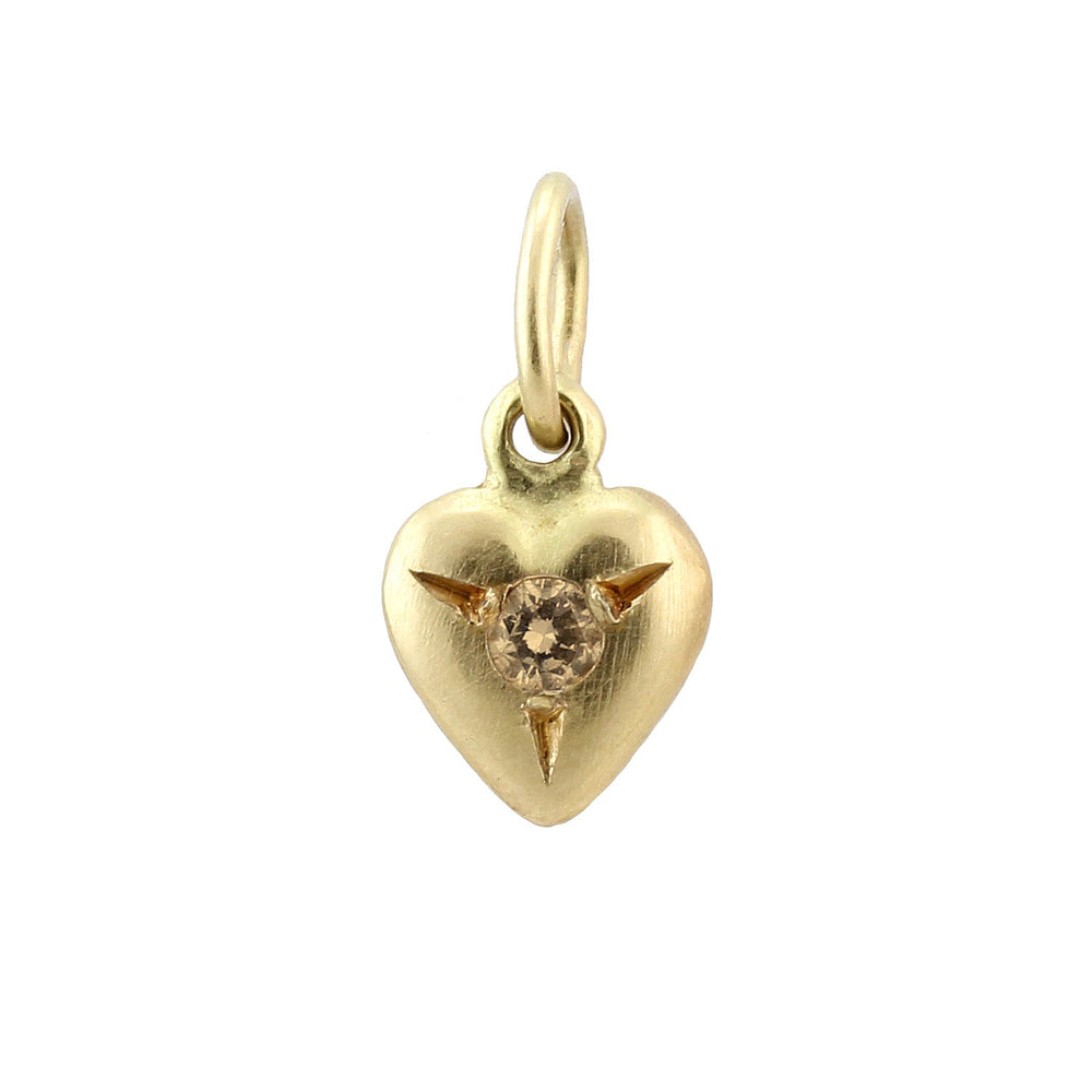 
                      
                        Front-facing view of Puff Heart Charm in 18k yellow gold with topaz by Betsy Barron.
                      
                    