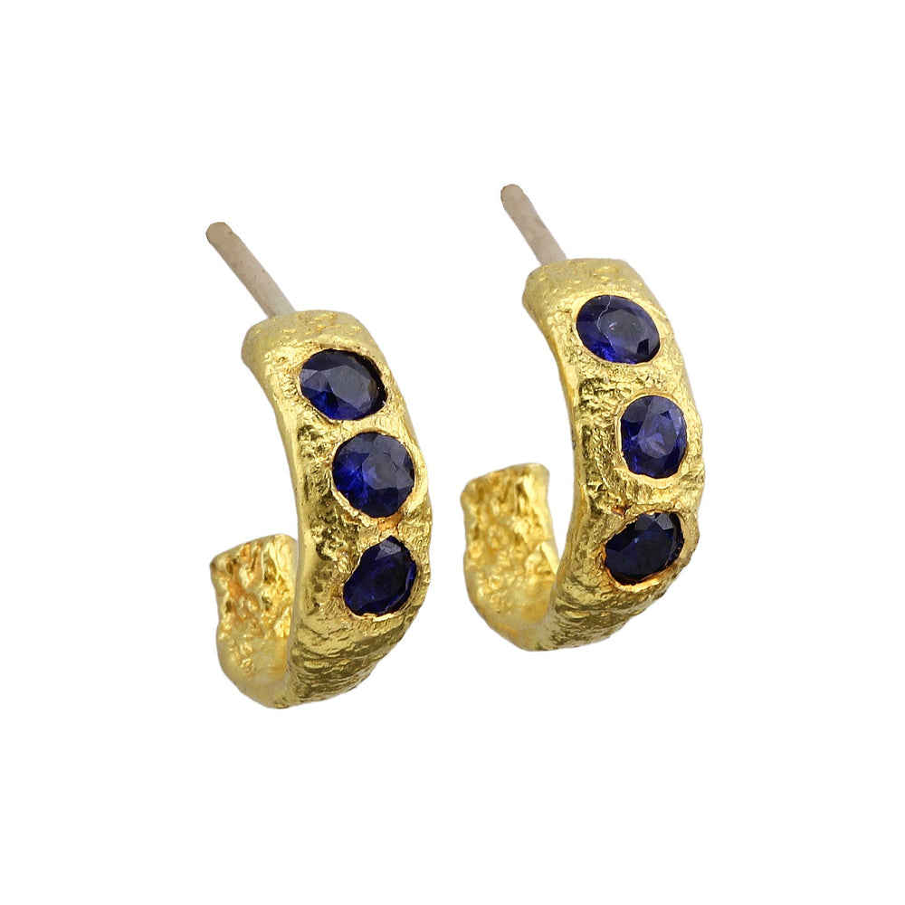 
                      
                        Angled view of Small Molten Hoop earrings with sapphires by Betsy Barron Jewellery
                      
                    