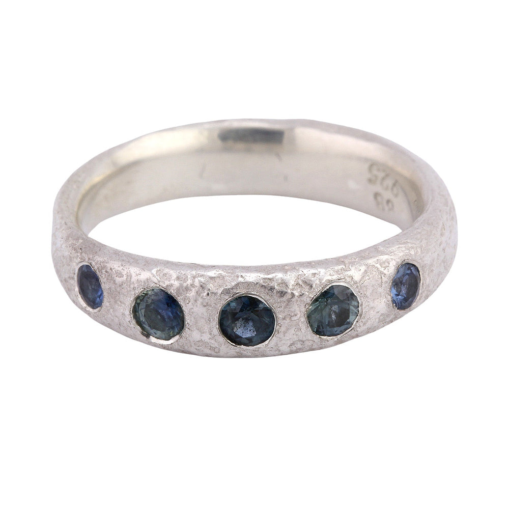 
                      
                        Front-facing view of narrow molten band in Sterling silver w/ 5 Blue/Green Sapphires, by Betsy Barron Jewellery
                      
                    