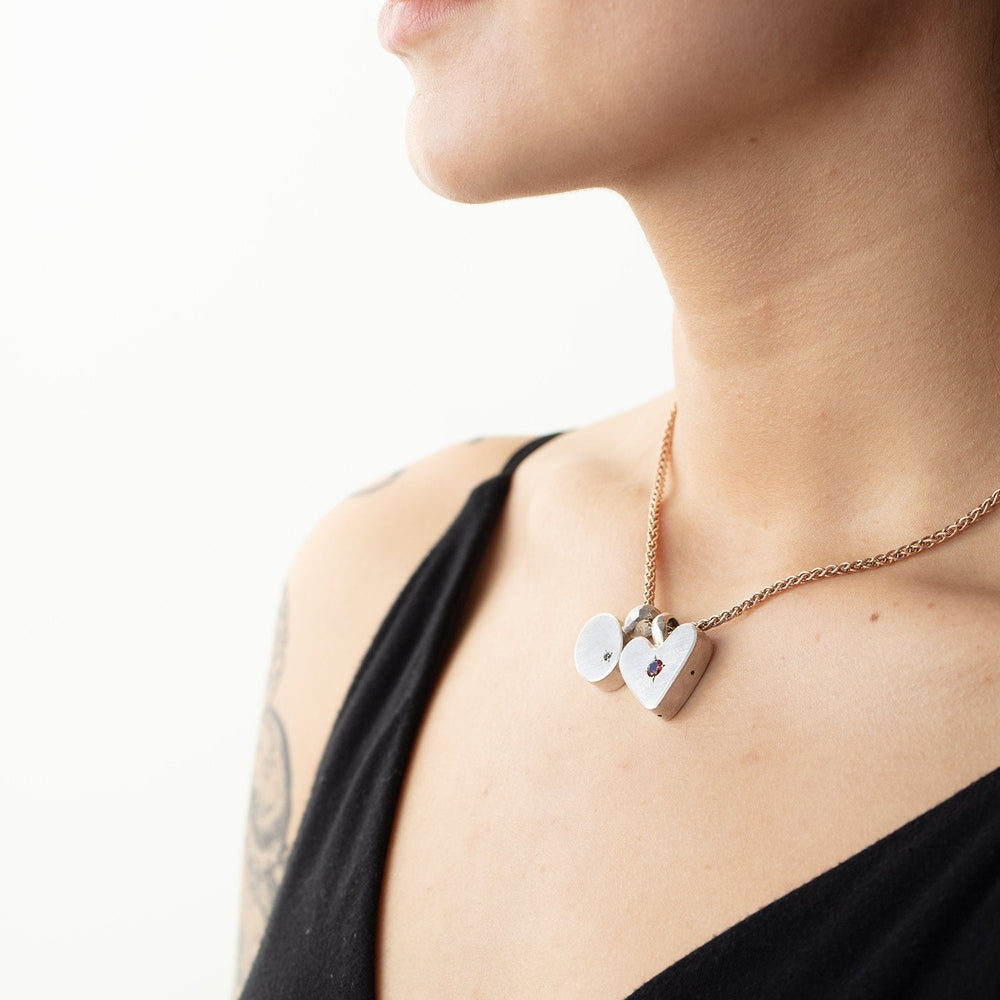 
                      
                        Classic Charm Necklace by Betsy Barron worn on model.
                      
                    