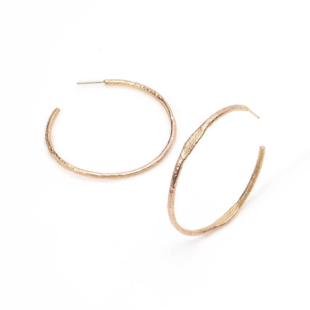 
                      
                        Tonia Hoop earrings in rose gold by Betsy Barron Jewellery
                      
                    