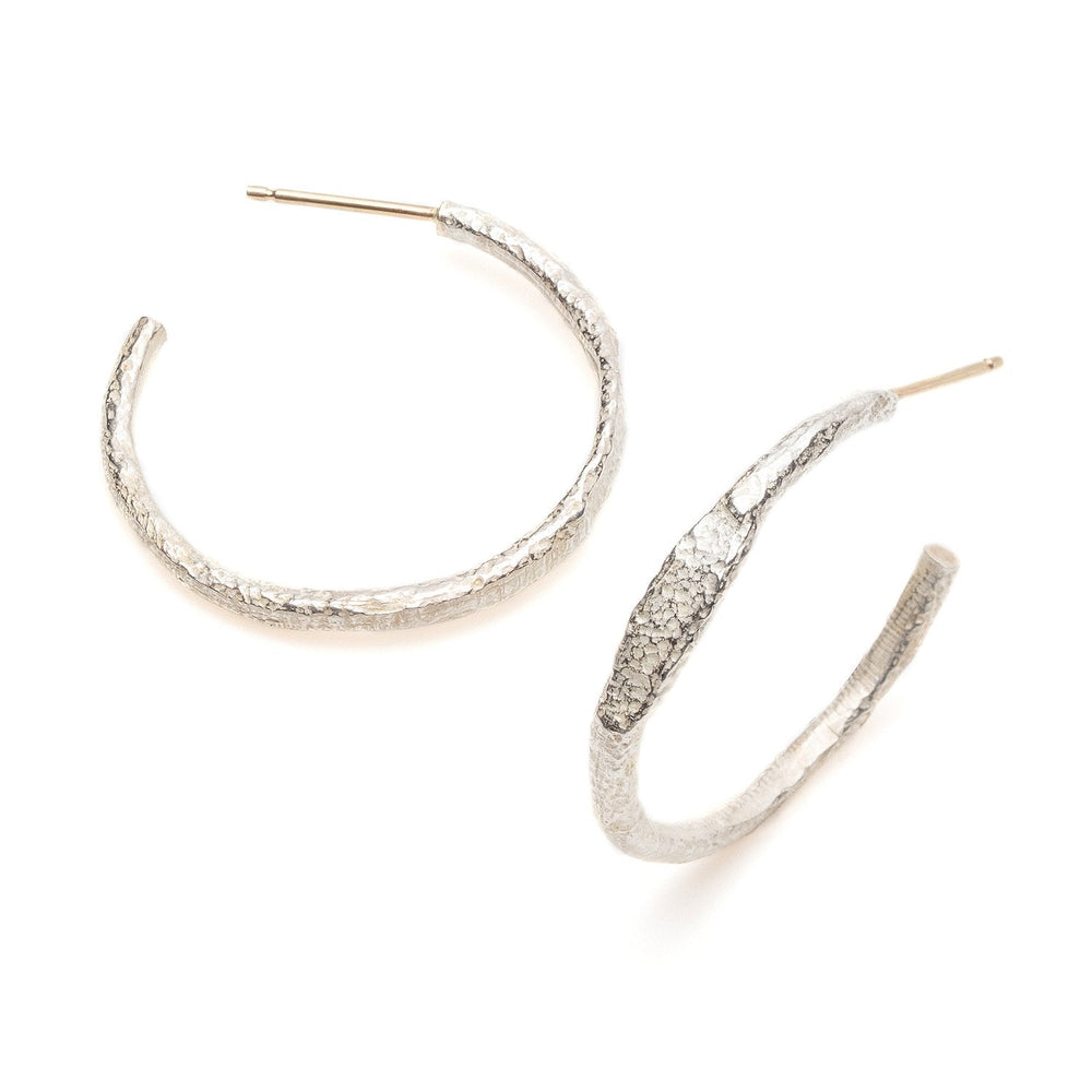 
                      
                        Two views of Beth Hoops by Betsy Barron in sterling silver
                      
                    