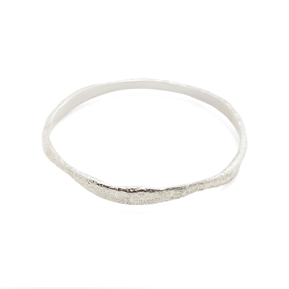 
                      
                        Molten Bangle in sterling silver
                      
                    