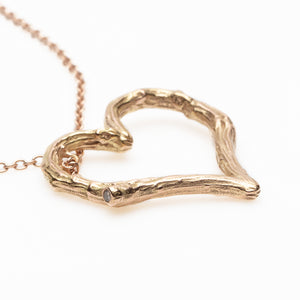 
            
                Load image into Gallery viewer, Detail view of Elio necklace in 14k rose gold
            
        